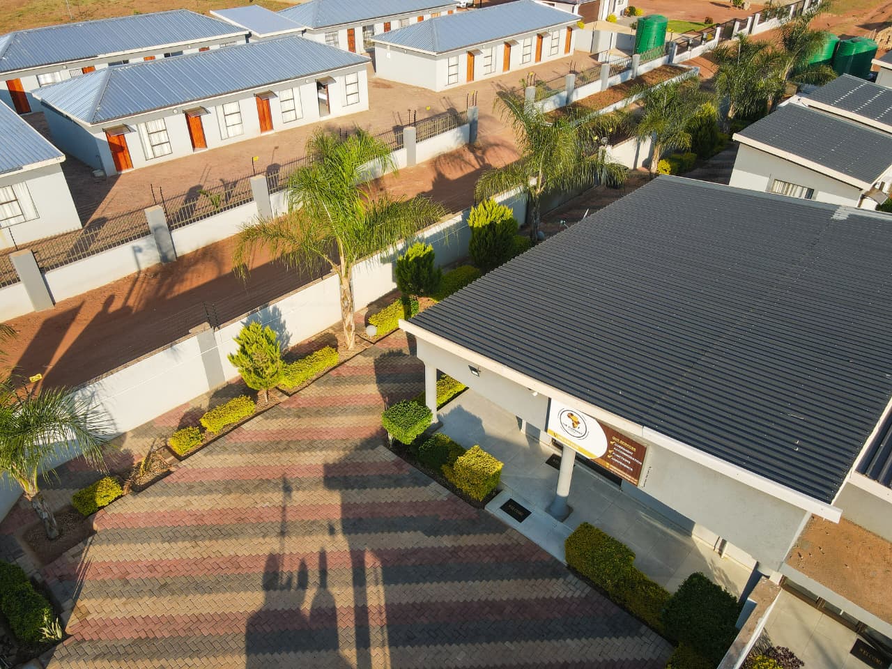 Aerial view of the lodge entrance and driveway