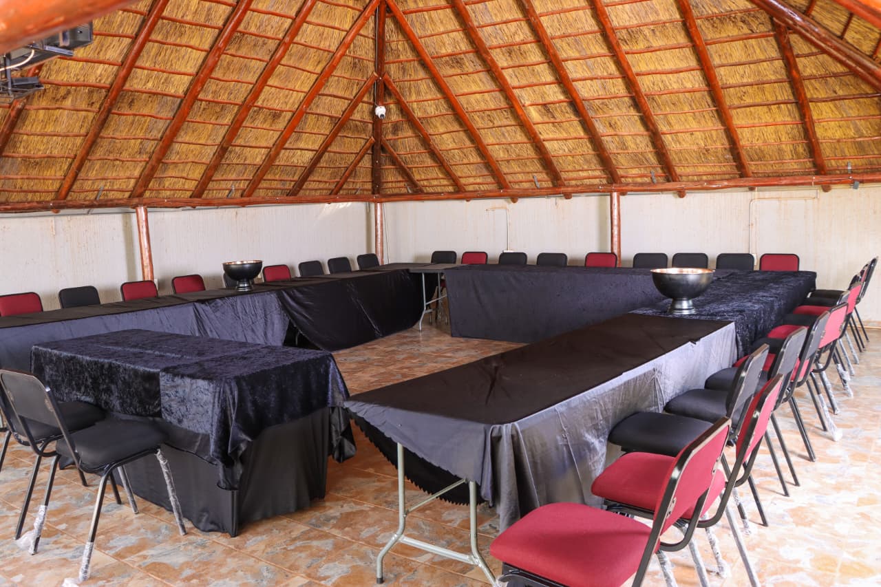 Function hall set up under thatched roof