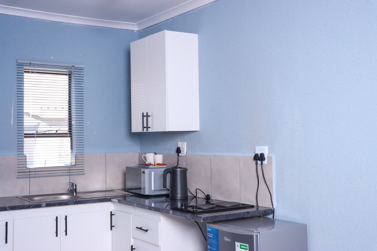 In-room kitchenette with microwave and kettle