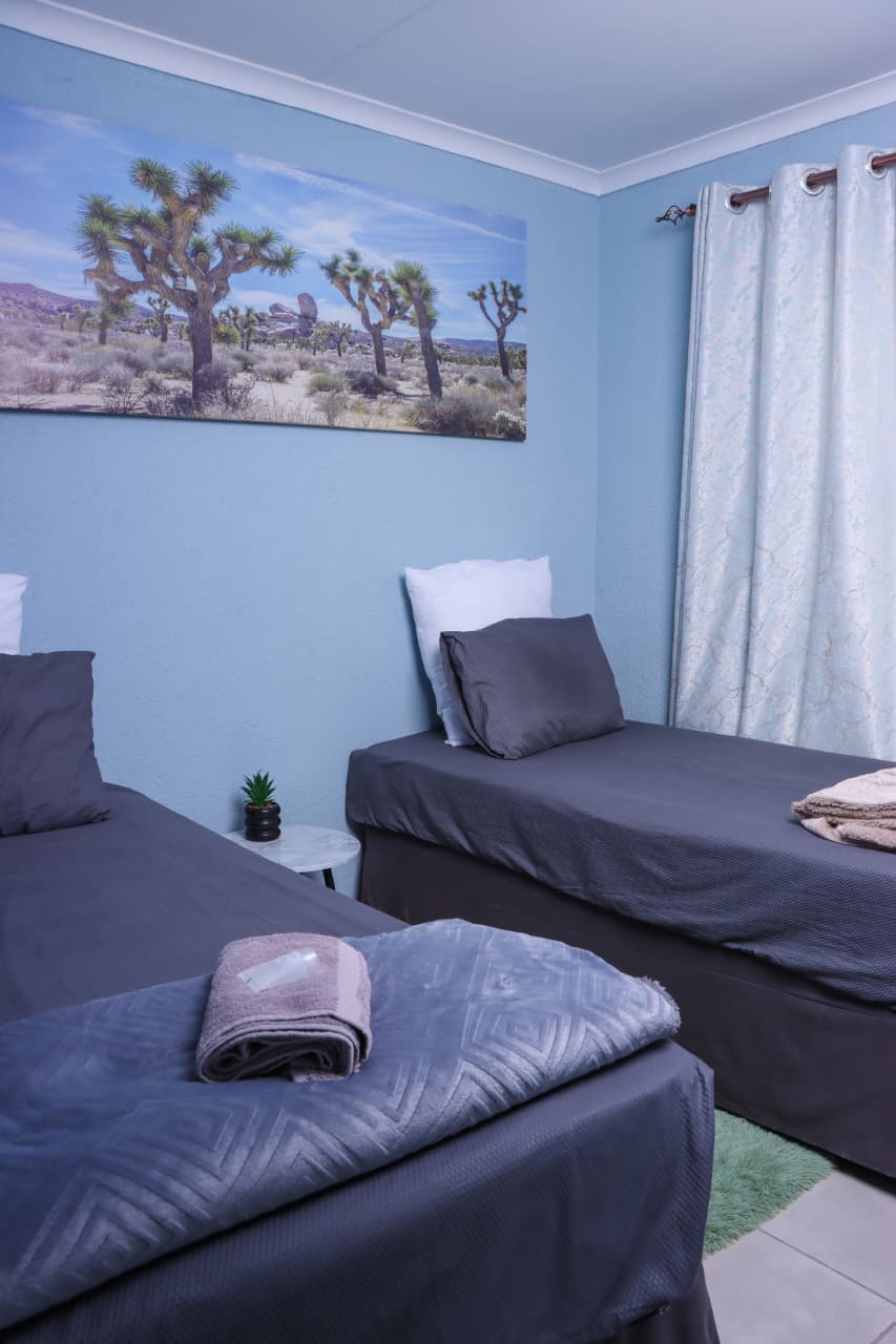 Twin room with two single beds at The Elephant Lodge